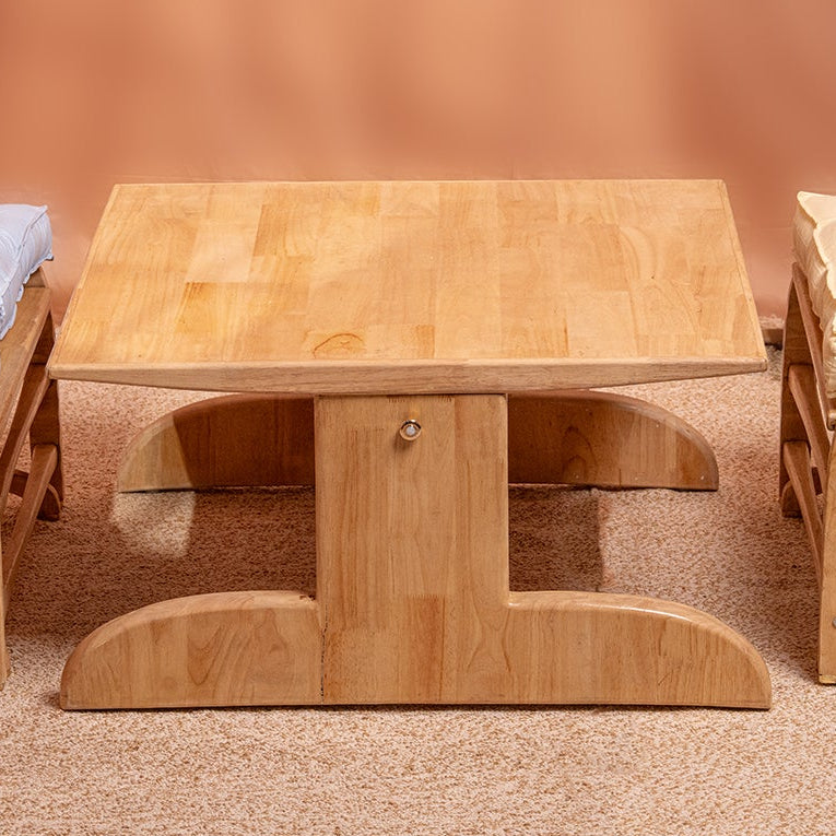 Wooden table with chairs and benches on a plain background